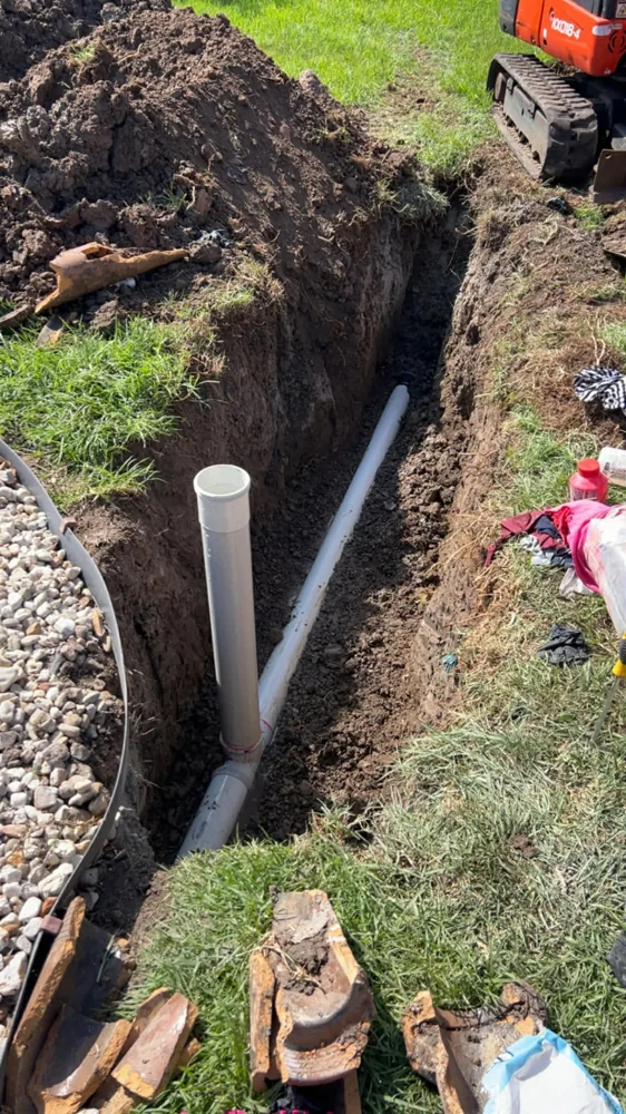 A drain line trench dug by Priority Plumbing Melbourne, a Dossis Digital client